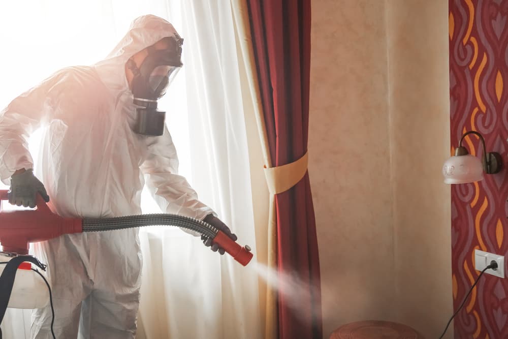 pest-control-specialist-white-hazmat-contractor-