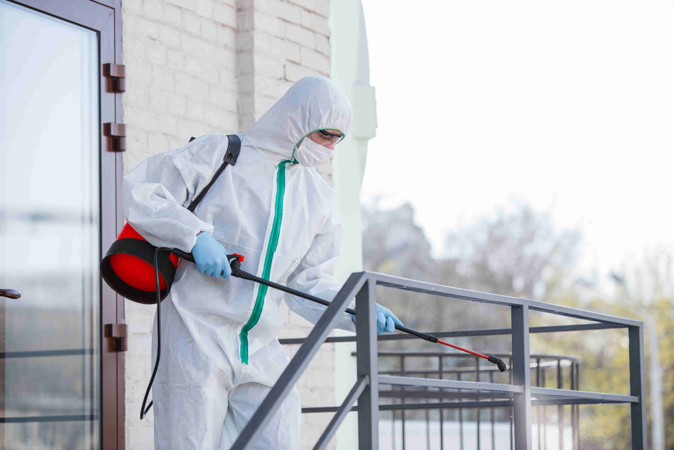 coronavirus-pandemic-disinfectant-protective-suit-mask-sprays-disinfectants-room